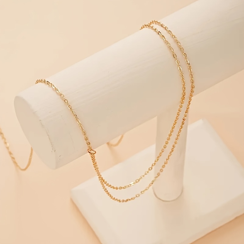 حزام خصر معدني ذهبي مزدوج الطب - مراجعة Body Jewelry وسعره
